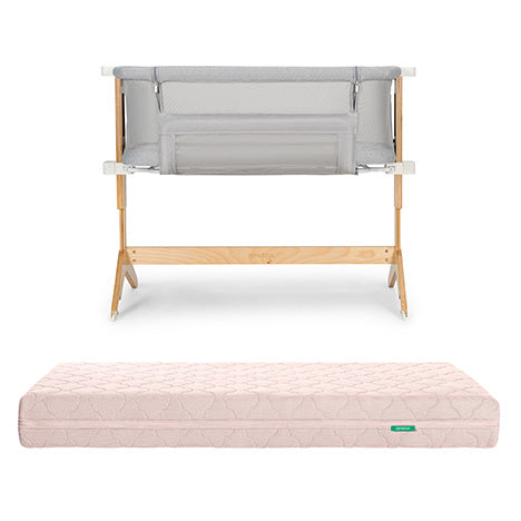 The Newton Baby Bundle 3 BFCM features a breathable bassinet with mesh sides and grey fabric, paired with a light pink quilted washable crib mattress, both shown on a white background.