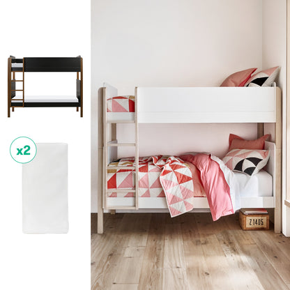 A Newton Baby Tip Toe Bunk Bed & Kids' Twin Mattress Bundle with white panels and geometric pink bedding is in a bright, wood-floored room. To the left, the bunk bed and twin mattresses are displayed as separate pieces.