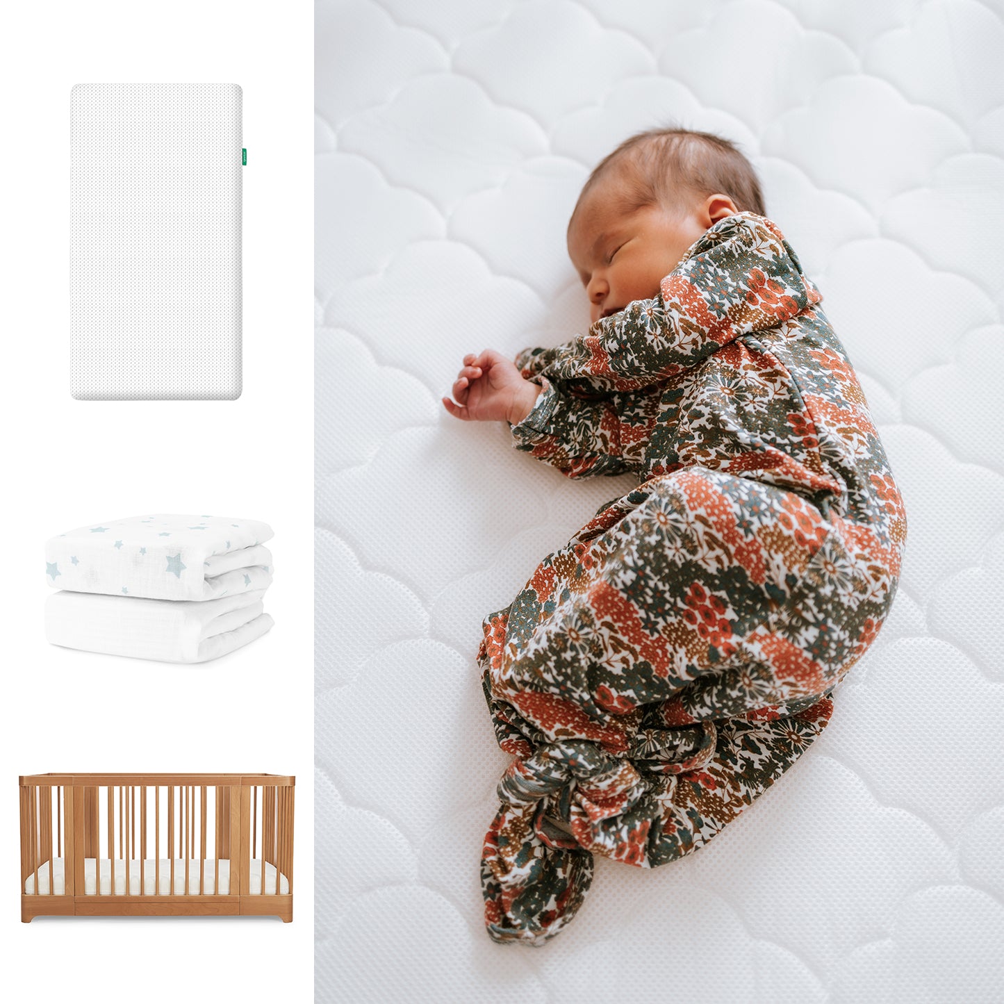 A baby in a floral swaddle sleeps on the Newton Baby Nest Convertible Crib with the Original Mattress and organic cotton sheets, next to a folded star-patterned blanket. 111-8420-CST-1000-WHT-SDW