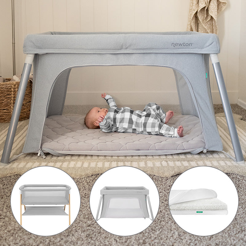 A baby in a gray checkered onesie lies inside the Newton Baby Bundle 2 BFCM playard with mesh sides. Three circular insets highlight the playard’s frame, mesh enclosure, and a close-up of its mattress.