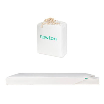A white crib mattress with a partially unzipped cover and a matching white drawstring storage bag, both featuring Newton Baby branding, are shown on a white background. Product: Bundle 1 BFCM by Newton Baby. SKIP