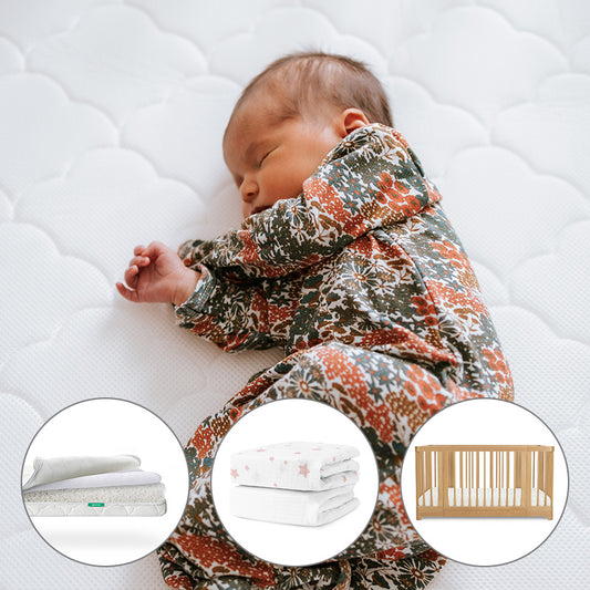 A baby sleeps on the Newton Baby Nest Convertible Crib with the Original Mattress, wearing a floral onesie. Insets below show a Breathable Organic Cotton Sheet, a star blanket, and the Nest Convertible Crib.