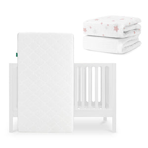 The Newton Baby Galileo Crib is paired with an Original Crib Mattress, a folded white sheet with pink stars, and a plain white sheet from the Sheets set. skip