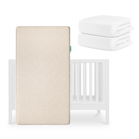 A beige Newton Baby Original Crib Mattress stands upright before a white Galileo Crib, with two folded Newton Baby Breathable Organic Cotton Sheets stacked at its side. All products are displayed against a plain white background. skip