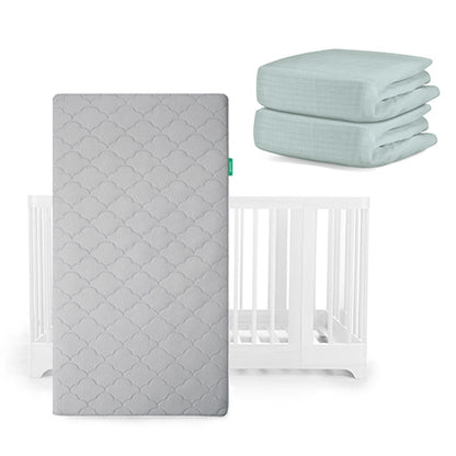 A Newton Baby Nest Convertible Crib and Original Mattress are shown with two folded blue breathable organic cotton sheets placed above and to the right.