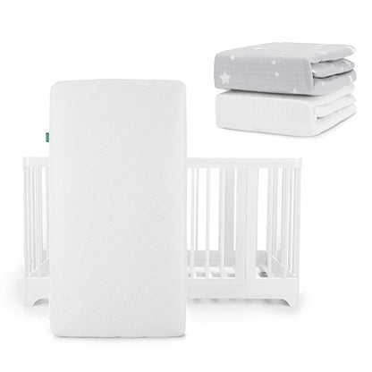 A Newton Baby Nest Convertible Crib with Original Mattress stands upright. In the upper right, two folded sheets—one gray with white stars, one solid white—feature a breathable organic cotton sheet for extra comfort.