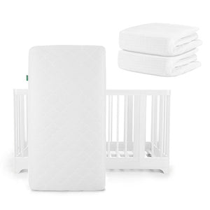 A Newton Baby Nest Convertible Crib with Original Mattress stands upright, while two white sheets, including a Breathable Organic Cotton Sheet, are stacked in the top right corner.