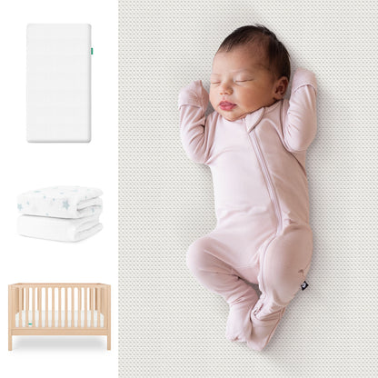 A newborn in a pale pink onesie sleeps on the Newton Baby Galileo Crib with the Essential Crib Mattress & Sheets Bundle. To the left are images of the mattress, patterned sheets, and the light wood crib. 111-8420-NAT-1300-WHT- SDW