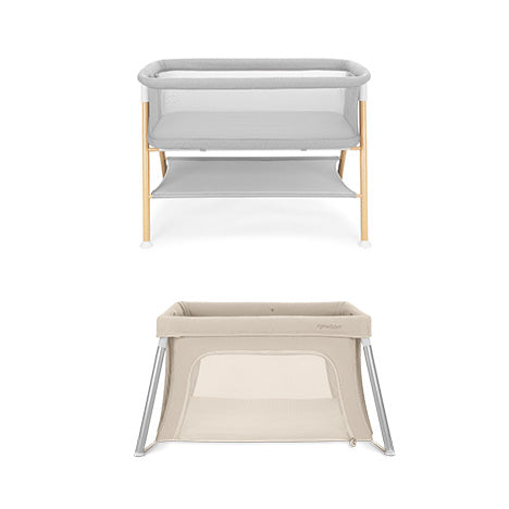 Two baby sleep solutions from Newton Baby: the Essential Bassinet with a light wood frame, grey fabric, and storage shelf sits above the Compact Travel Crib in beige with mesh sides and a foldable metal frame, both against a white background.