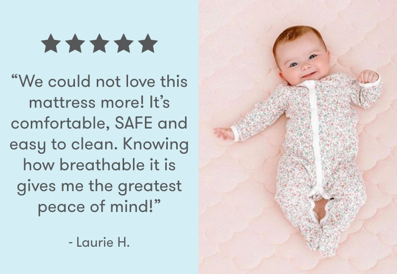 A smiling baby lying on a pink breathable mattress with a customer review saying "We could not love this mattress more! It's comfortable, SAFE and easy to clean. Knowing how breathable it is gives me the greatest peace of mind!" - Laurie H., and five stars rating above the text.