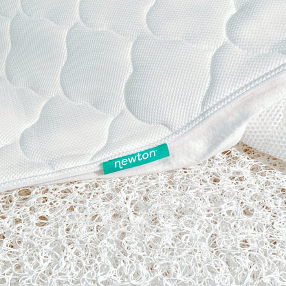 close up of newton mattress cover and innovative newton wovenaire core
