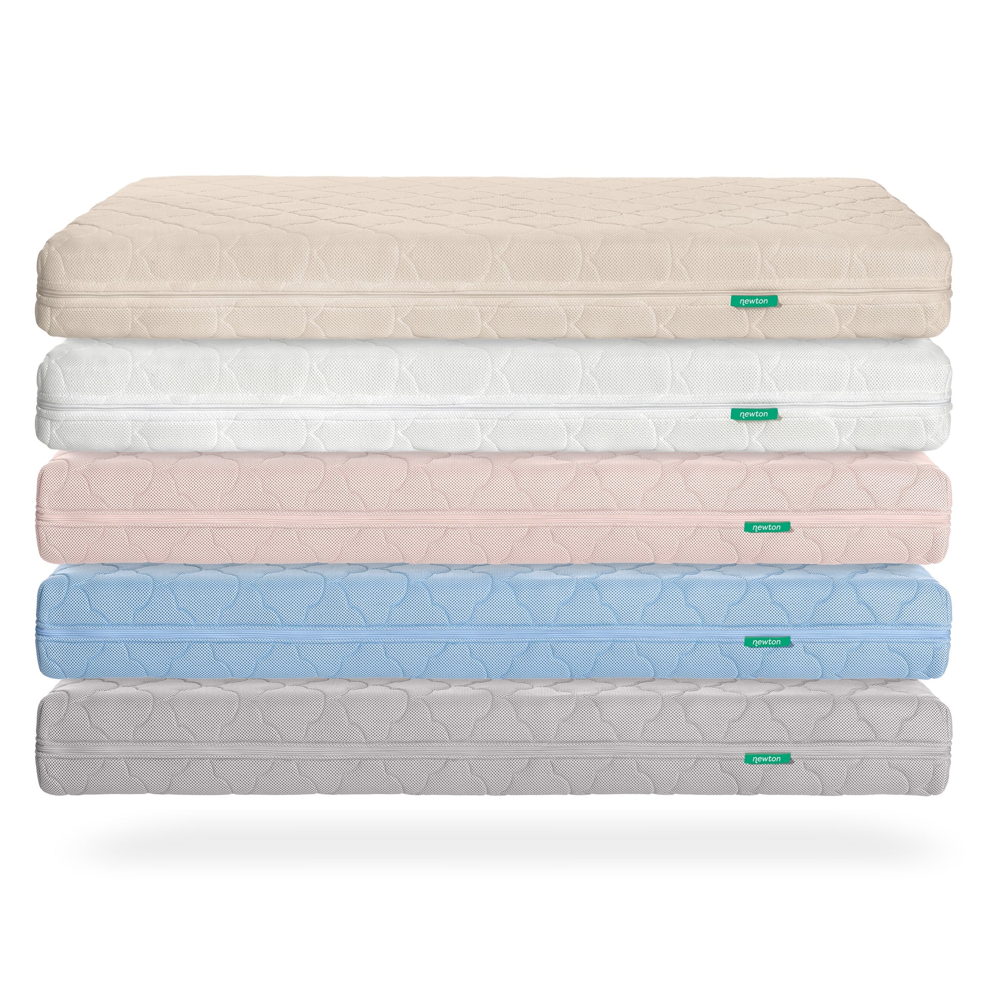 A stack of five Newton Baby Crib Mattresses in beige, white, pink, blue, and gray is shown against a white background. Each mattress features ultra-breathable material, a subtle textured pattern, and a small green tag on the side.