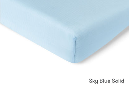 Close-up of a sky blue solid sheet. 999-3020-BNB 999-3520-BNB