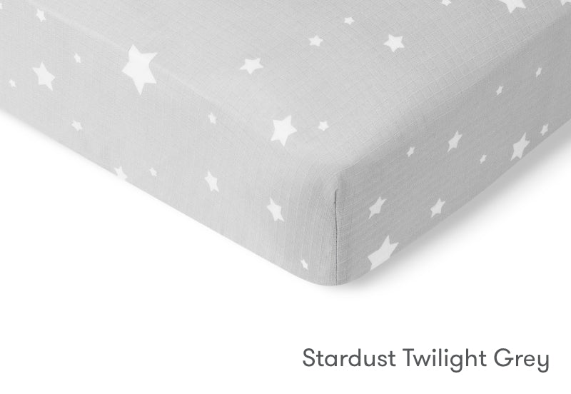 Close-up of a Stardust Twilight Grey sheet with a star pattern. 999-3020-SGW 999-3520-SGW