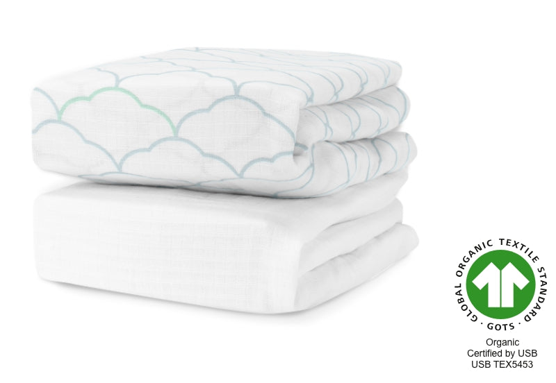 Two folded baby mattresses with a cloud pattern and a "GOTS Organic Textile Standard certified by USB TEX5453" label. 999-3020-DWW 999-3520-DWW