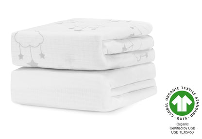 A stack of three organic white baby blankets with cute cloud and star designs, certified by GOTS and USB with certification number USB TEX5453. 999-3020-WSW 999-3520-WSW