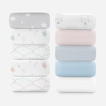 Stack of ten sheets in assorted designs including stars, clouds, and plain colors.