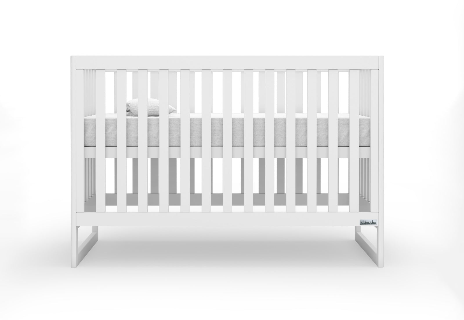 A minimalist white baby crib with slender bars and a visible Newton Baby logo on one end.