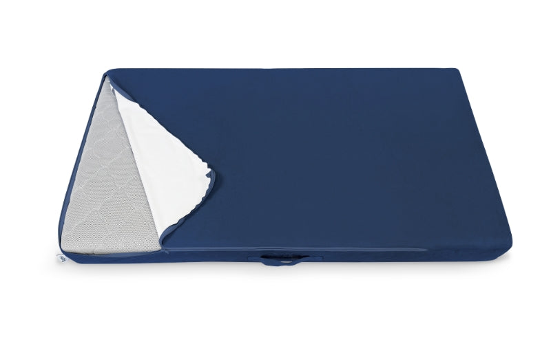 A figgy couch piece with a removable navy cover partially peeled back to reveal the inner material.